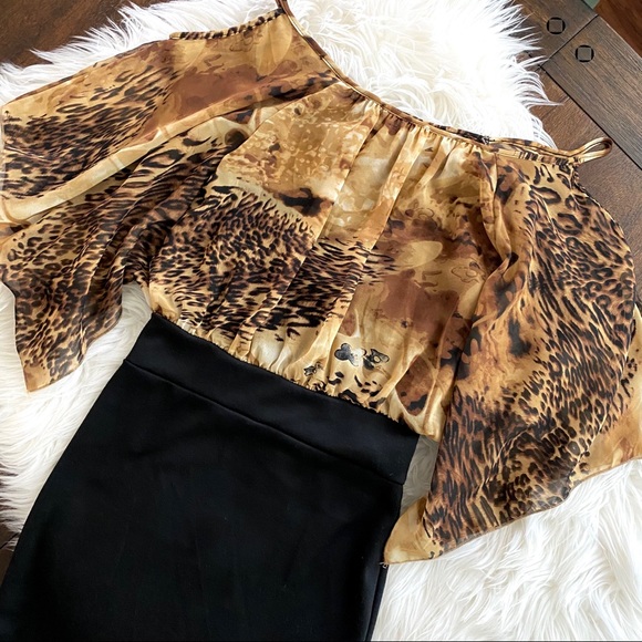 leopard print dress with black top underneath